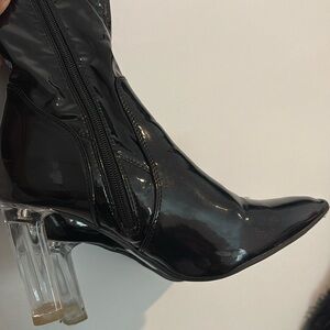 Black boots with clear heel.  Only worn 1x.